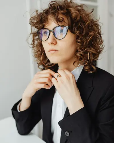 Professional portrait of female sustainability expert with warm smile