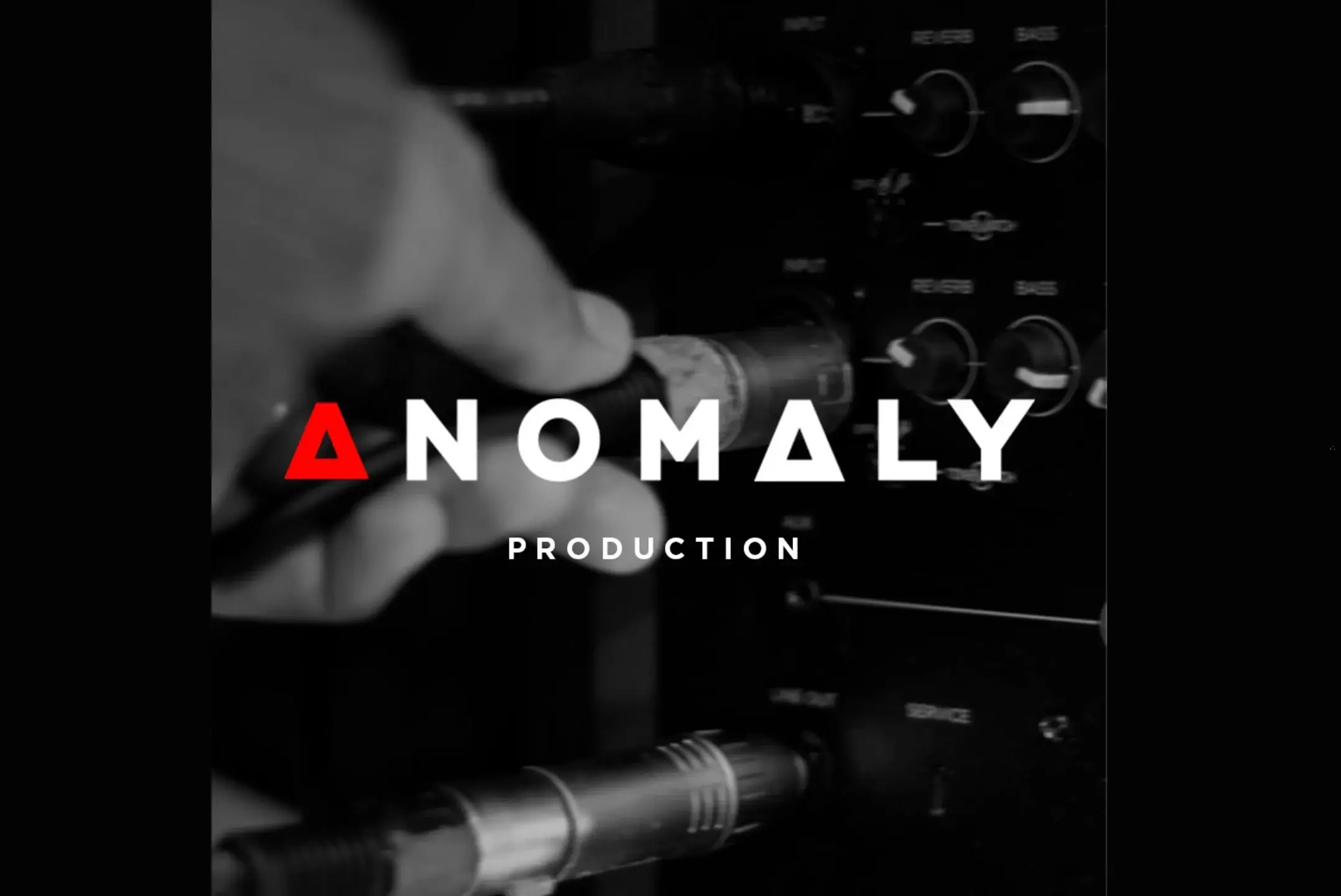 Minimalist concrete skyscraper reaching towards a clear sky